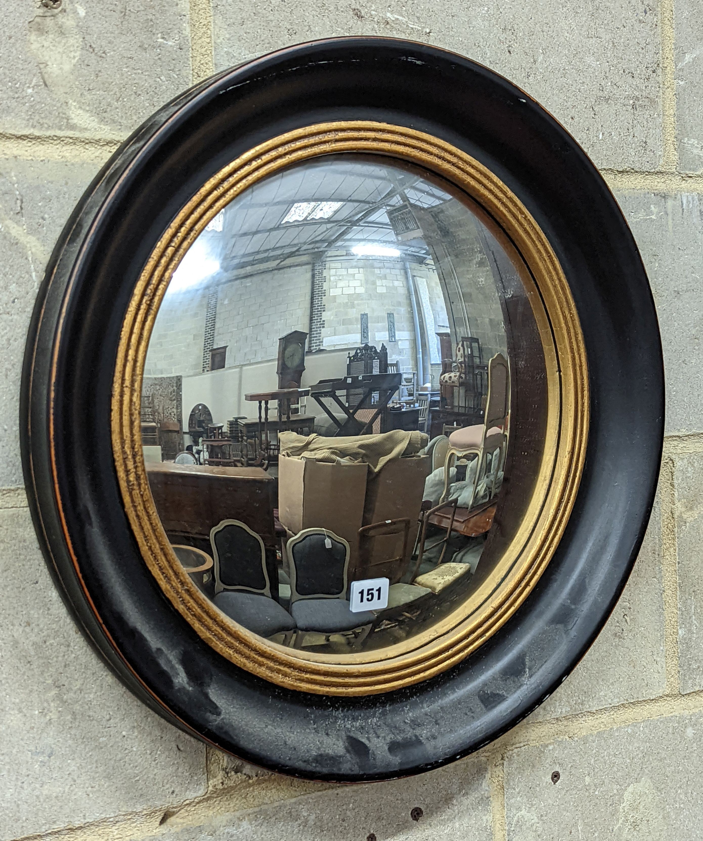A Regency style circular convex wall mirror, diameter 53cm